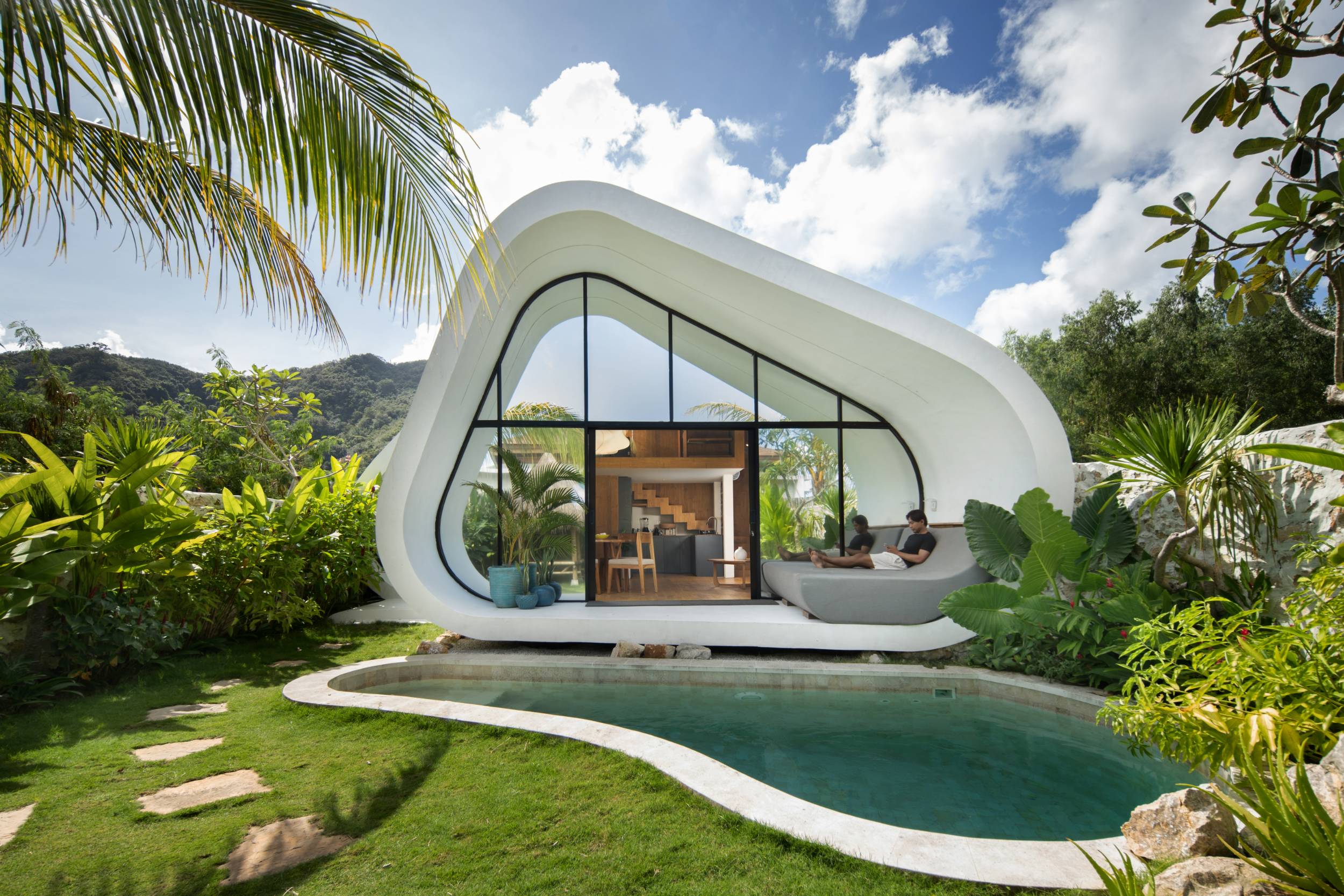The Shell Villa's curved white exterior with private plunge pool
