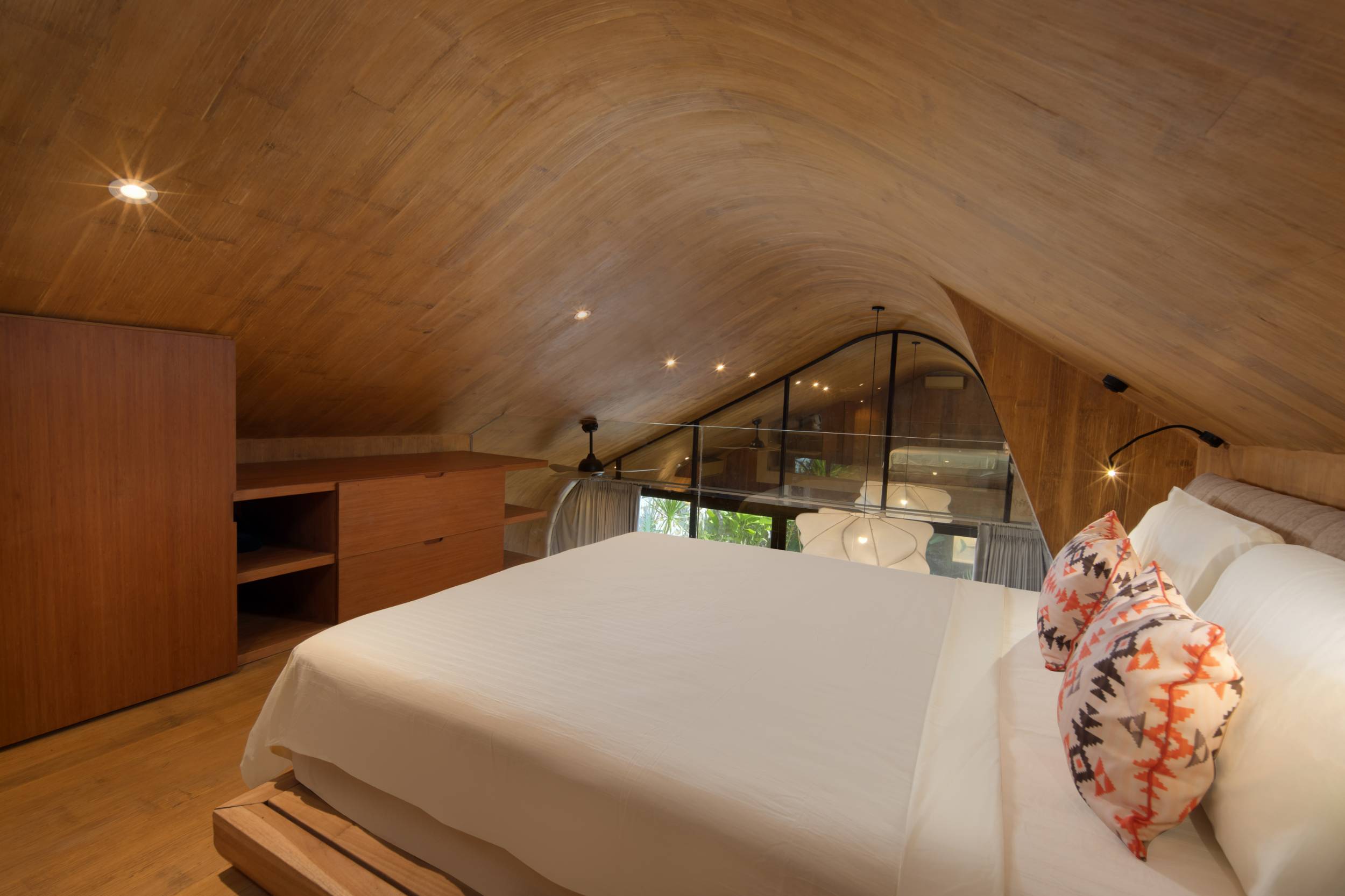 Loft bedroom with vaulted bamboo ceiling, The Shell Villa
